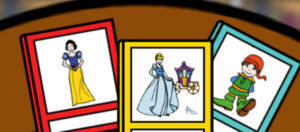 Libros de Cuentos: Cenicienta vestida para la fiesta con la carroza detrás, blancanieves y pulgarcito, sobre una mesa